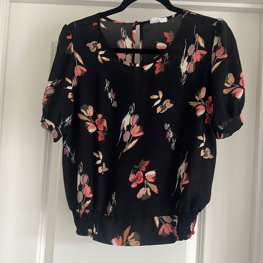 Size large. Worn once. Black floral top